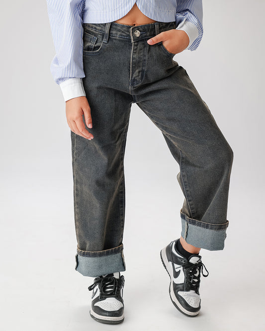 Jeans slavato con piega